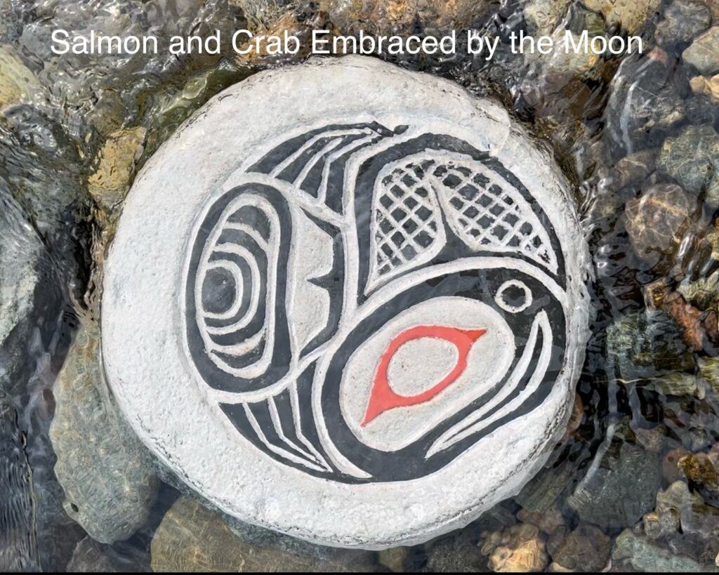The Salmon and Crab I. Carved into the Moon and represents the abundance of land and sea that offered to you.